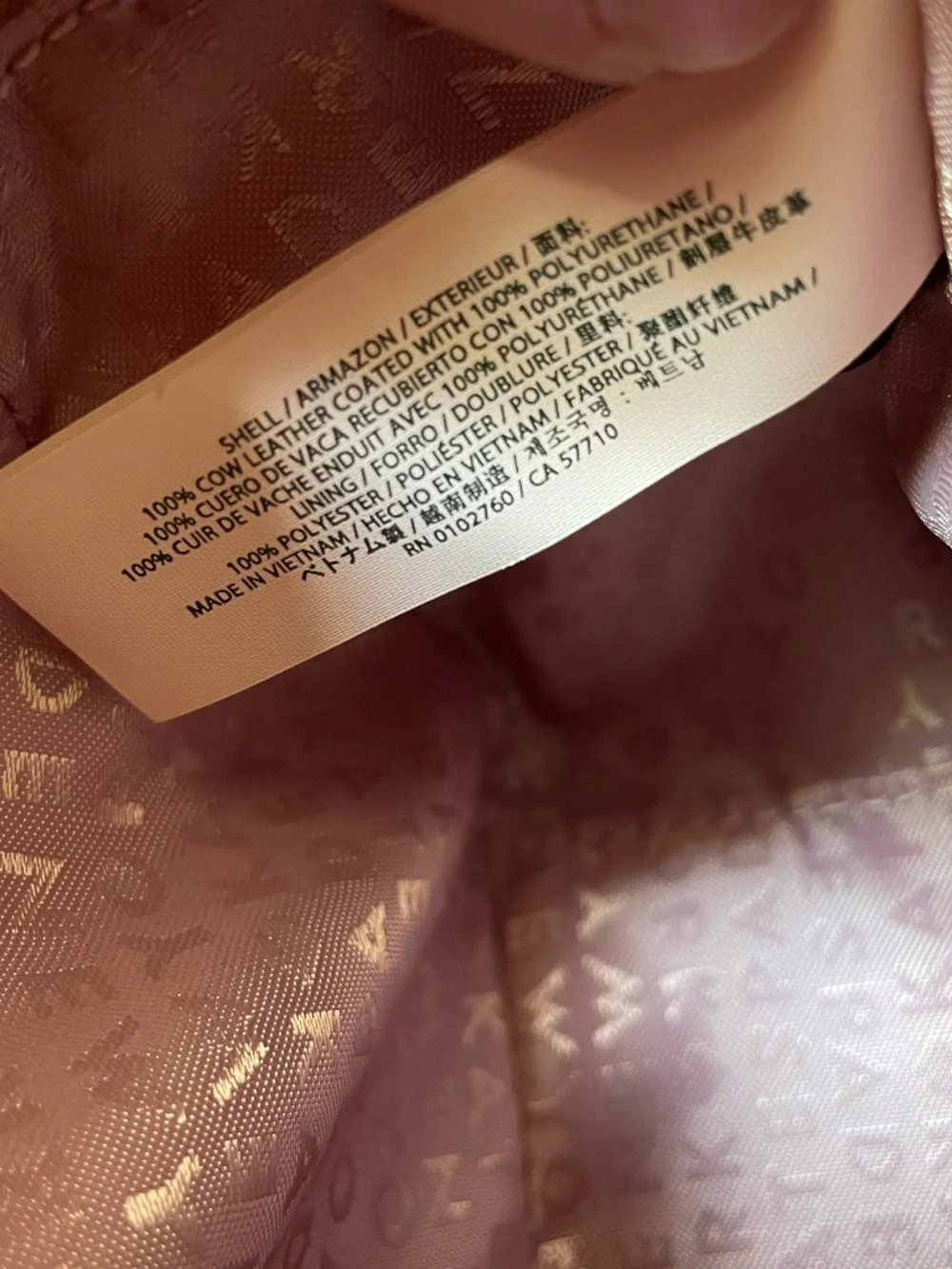 Kate Spade Newbury Lane Cammie crossbody bag in dusty peony pink